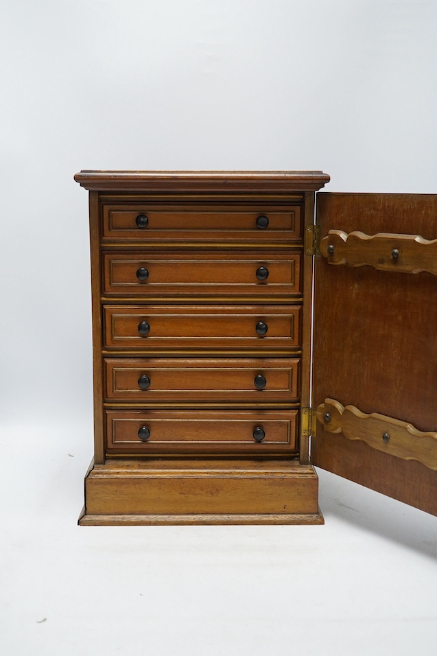 A pair of Victorian Aesthetic period oak table top cabinets, each with five drawers, 38cm high. Condition - fair to good